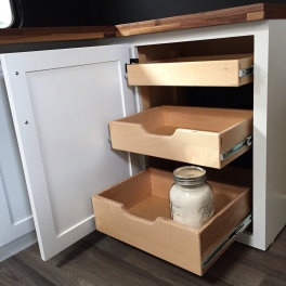 dry goods and spice storage in travel trailer turned tiny house