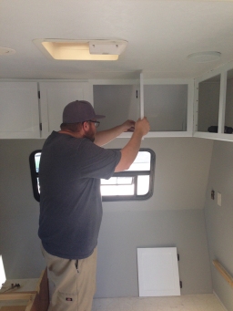 Installing the Cabinet Doors in our travel trailer to tiny house conversion remodel