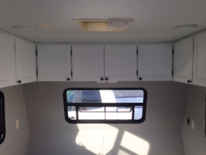 Installing the Cabinet Doors in our travel trailer to tiny house conversion remodel